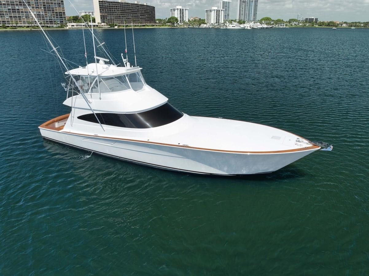 a white boat on the water aboard MISS CARRIE Yacht for Sale