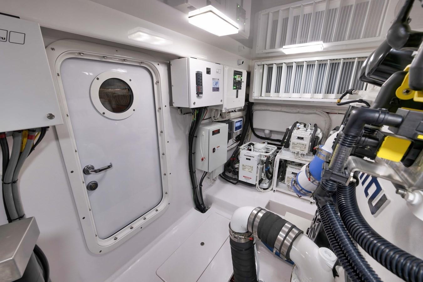 a machine with a large white object aboard MISS CARRIE Yacht for Sale