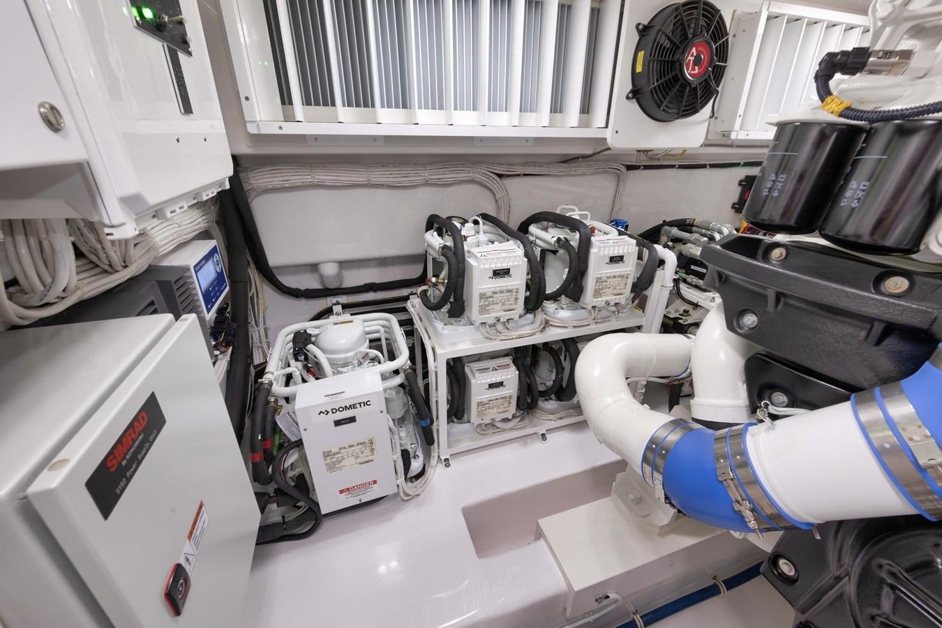 a person in a lab coat aboard MISS CARRIE Yacht for Sale