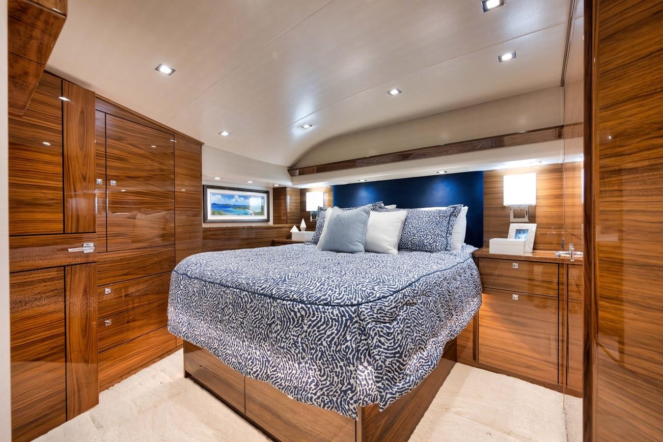 a bed in a room aboard MISS CARRIE Yacht for Sale