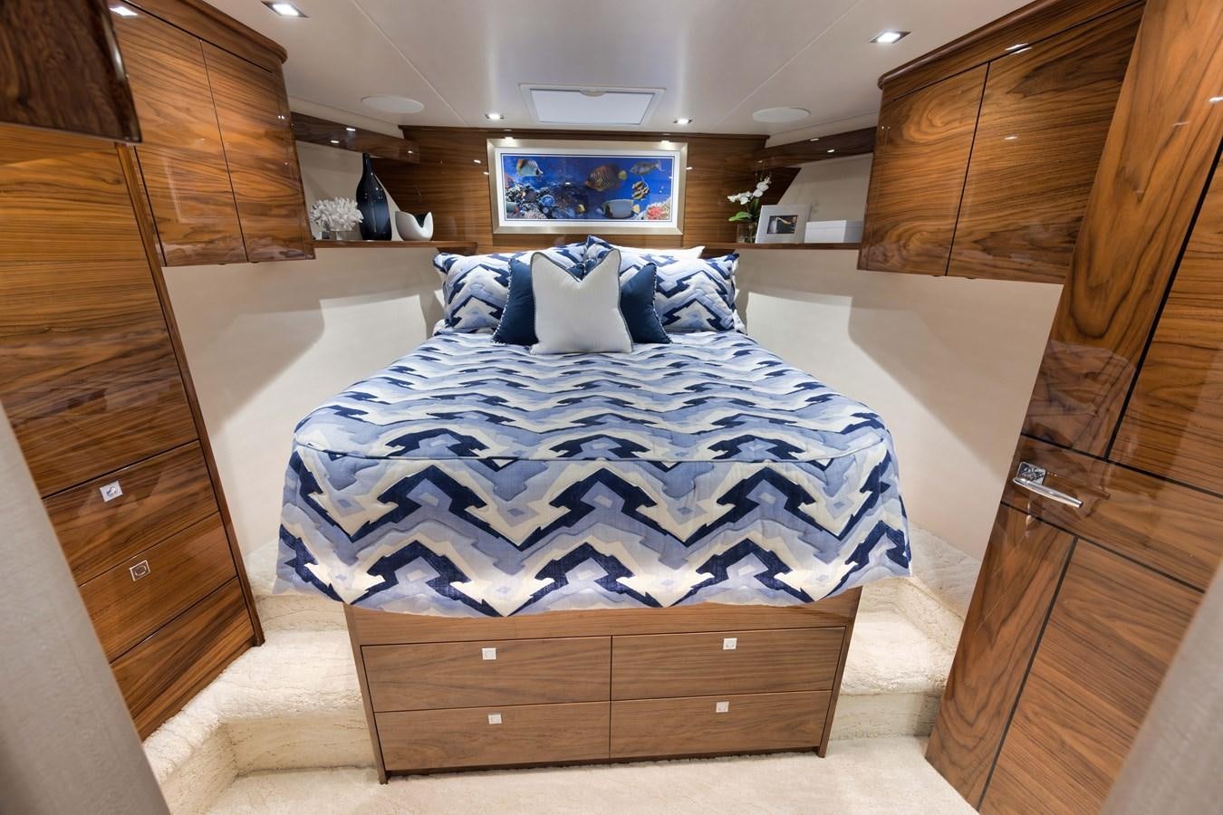 a bed in a room aboard MISS CARRIE Yacht for Sale