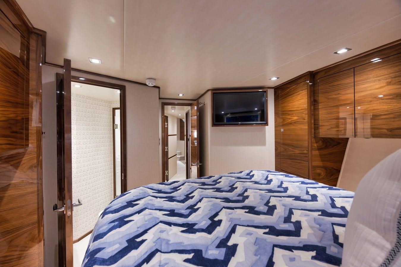 a bed in a room aboard MISS CARRIE Yacht for Sale