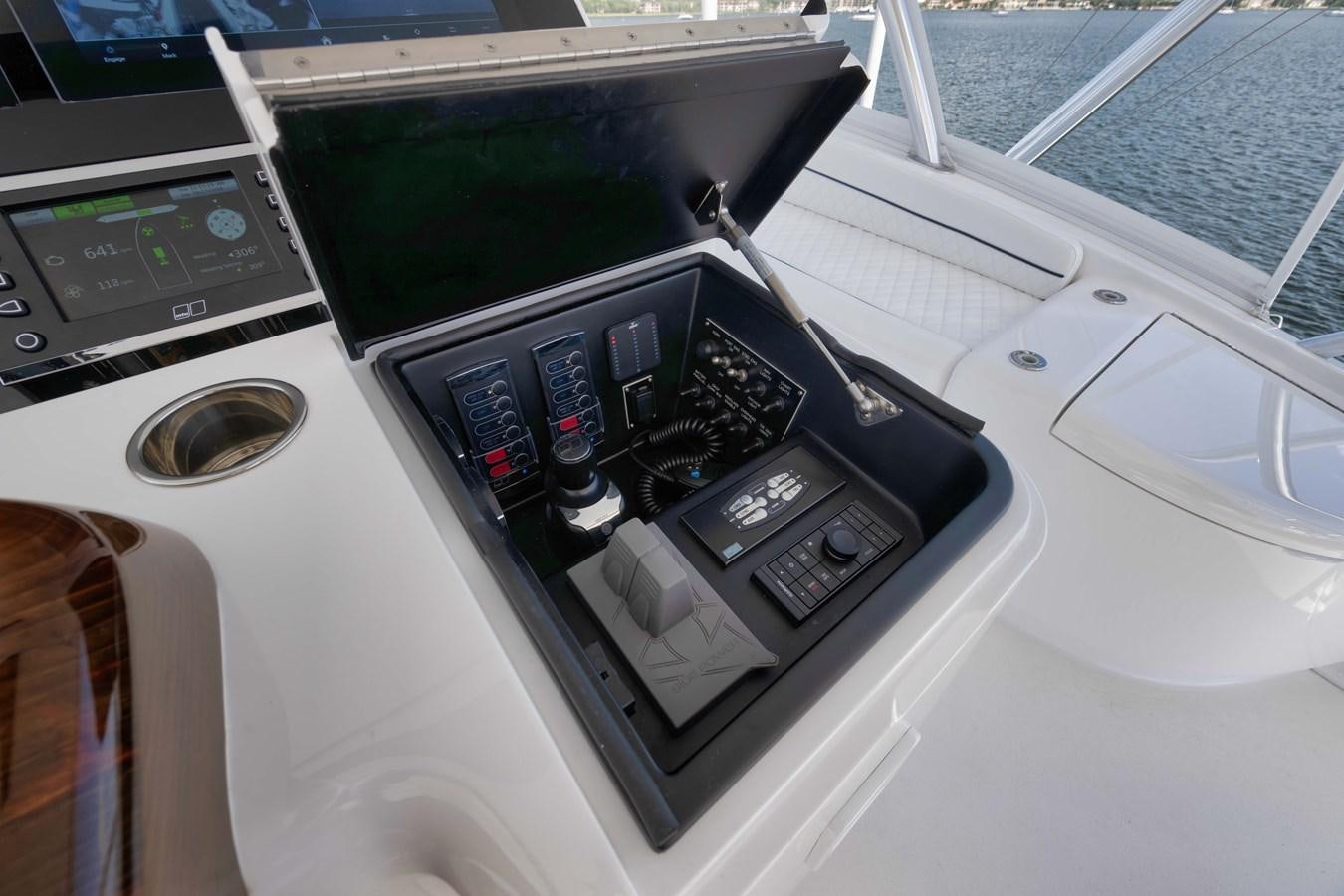 a car with a screen aboard MISS CARRIE Yacht for Sale