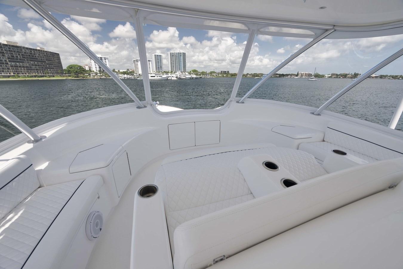 a white boat on the water aboard MISS CARRIE Yacht for Sale