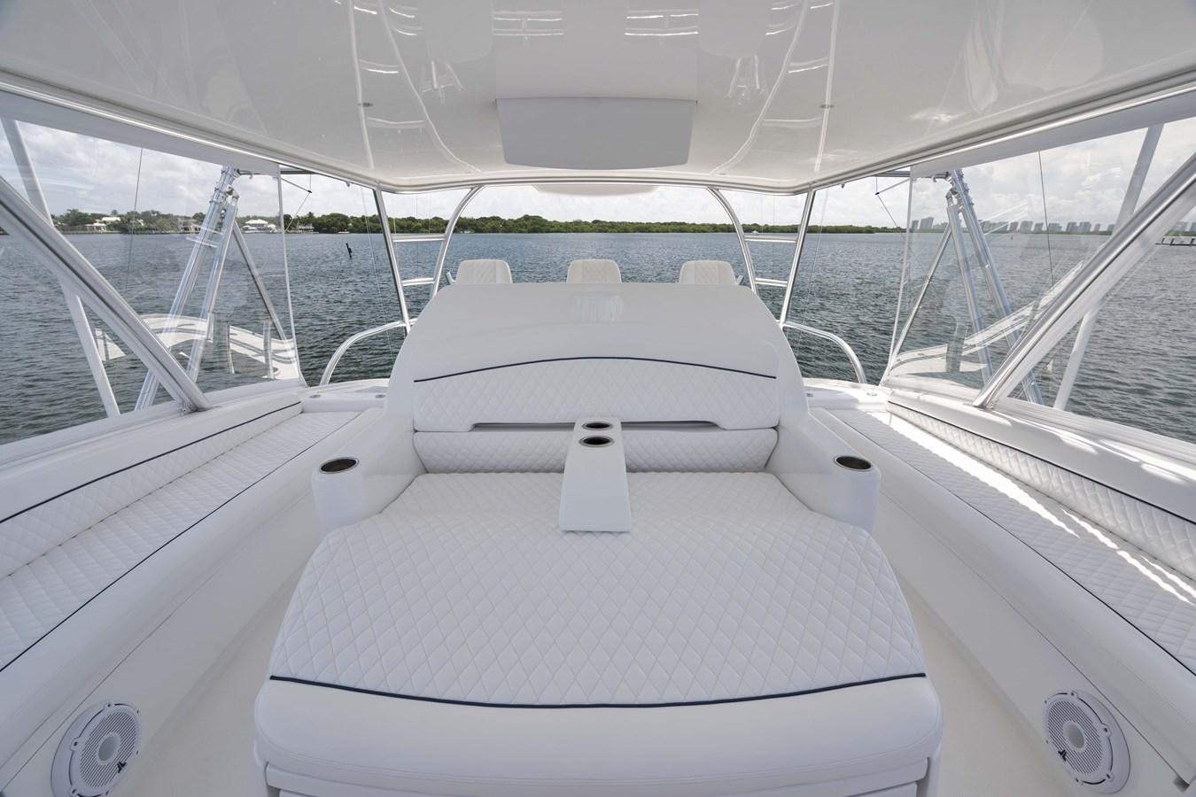 the interior of a white car aboard MISS CARRIE Yacht for Sale