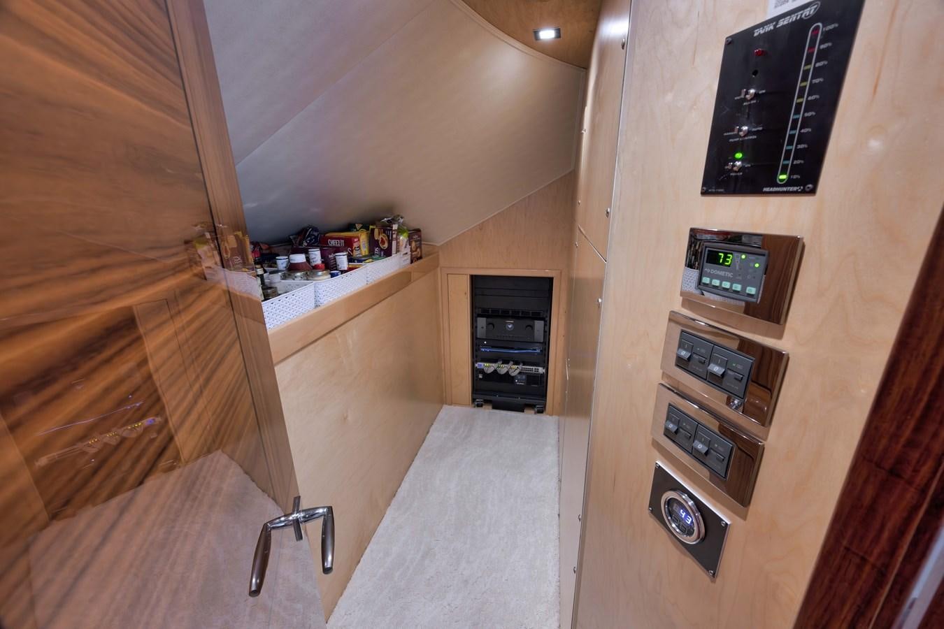 a kitchen with a stove and oven aboard MISS CARRIE Yacht for Sale