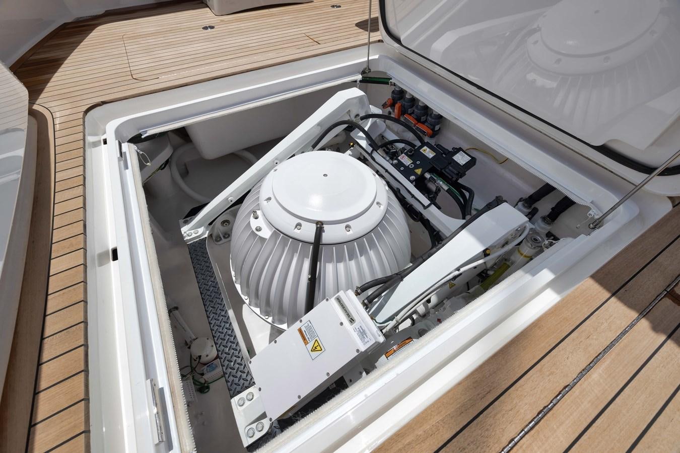 a white machine inside a box aboard MISS CARRIE Yacht for Sale