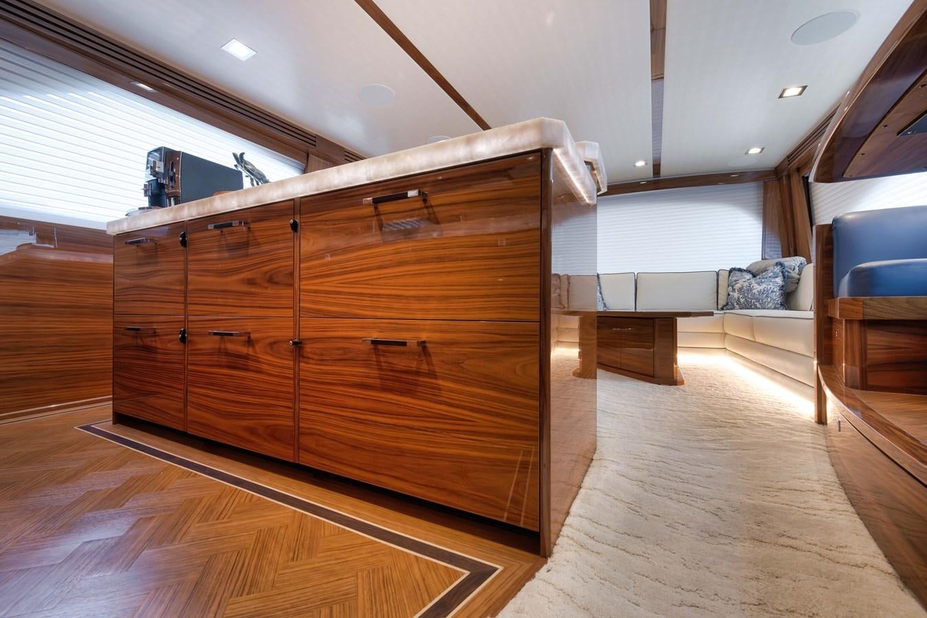 a wooden cabinet in a room aboard MISS CARRIE Yacht for Sale