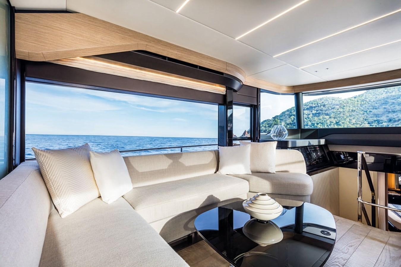 a room with a large window and a view of the ocean aboard NAVETTA 75 Yacht for Sale