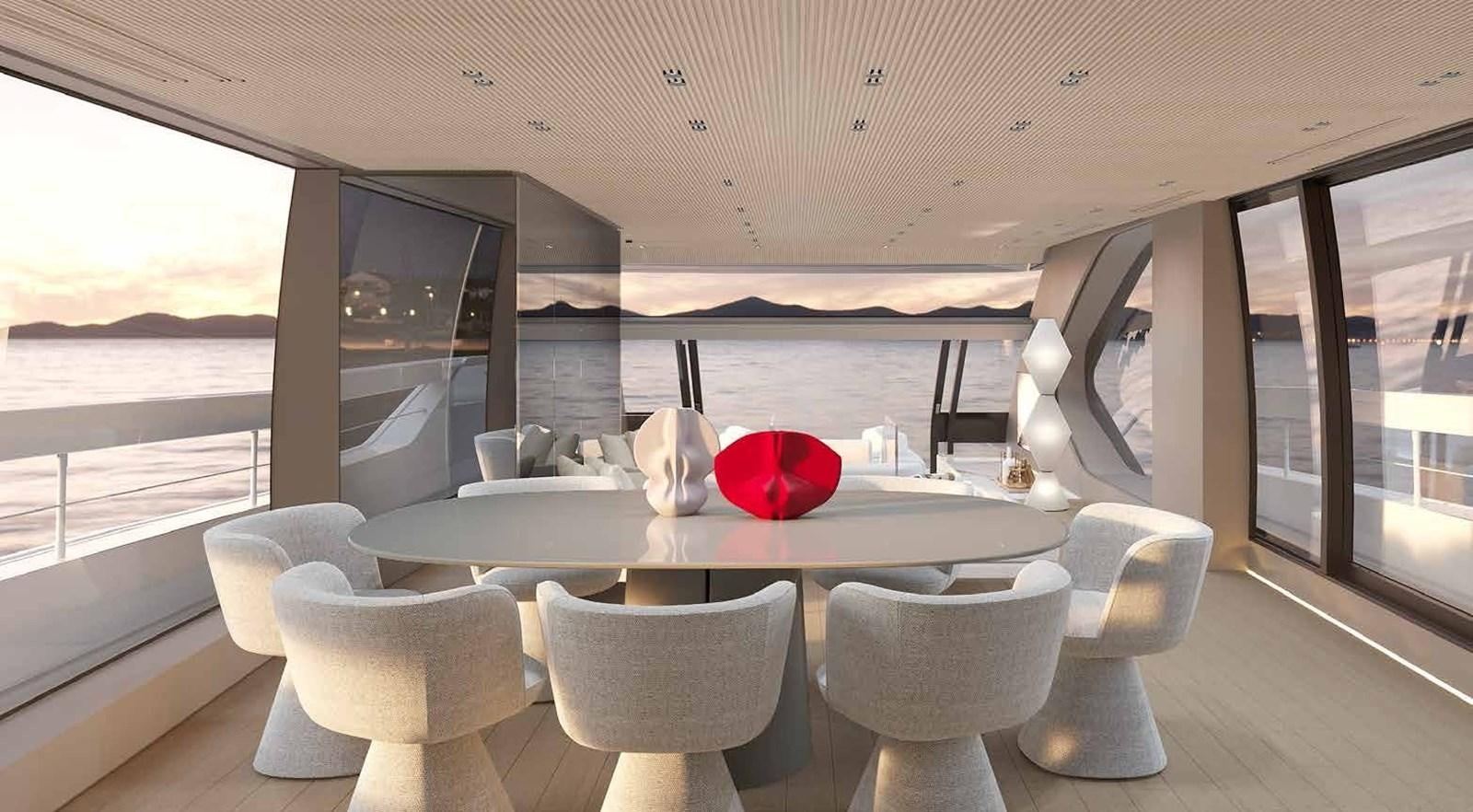 a table with chairs and a red bowl on it aboard 2024 SANLORENZO SP92 #16 Yacht for Sale