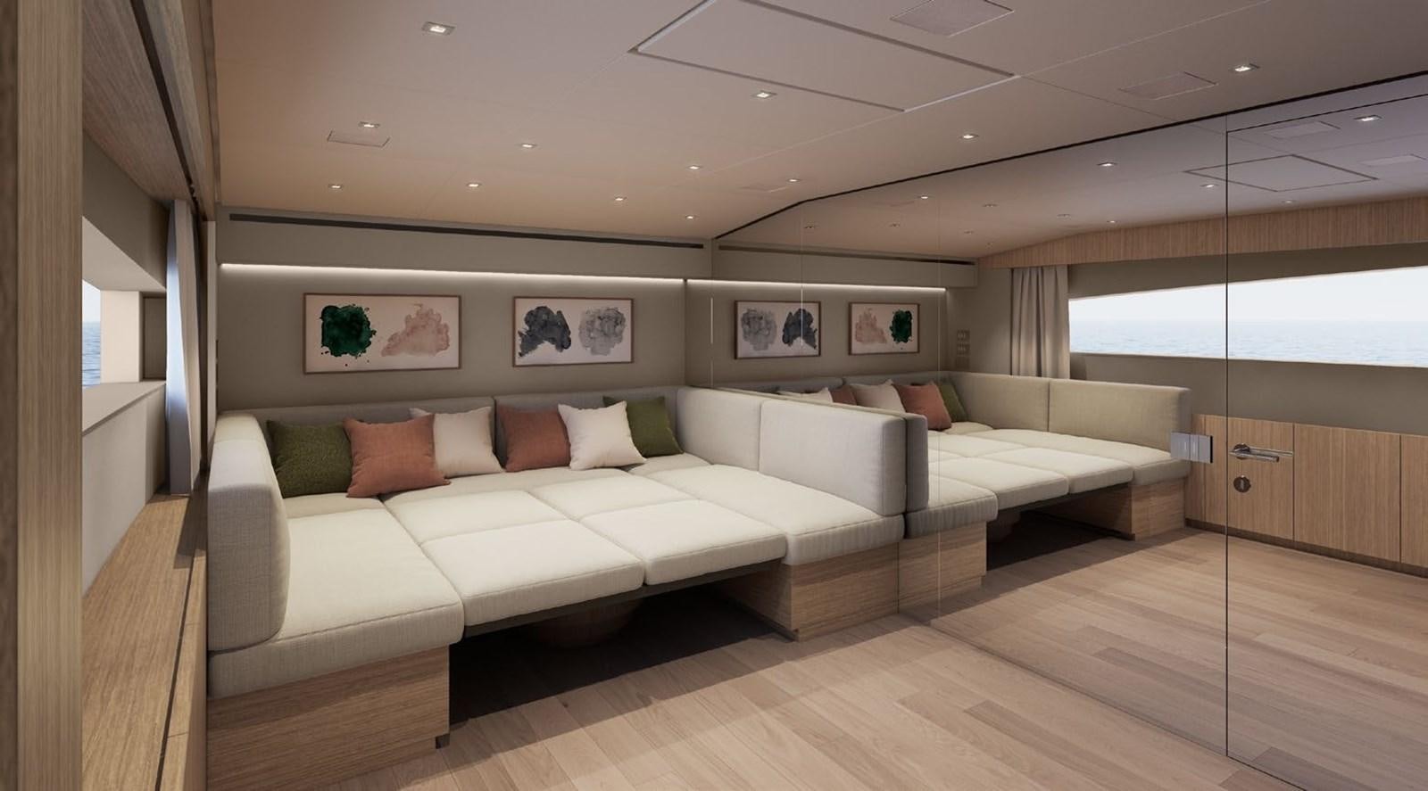 a large white couch in a room aboard ALMA BLU Yacht for Sale