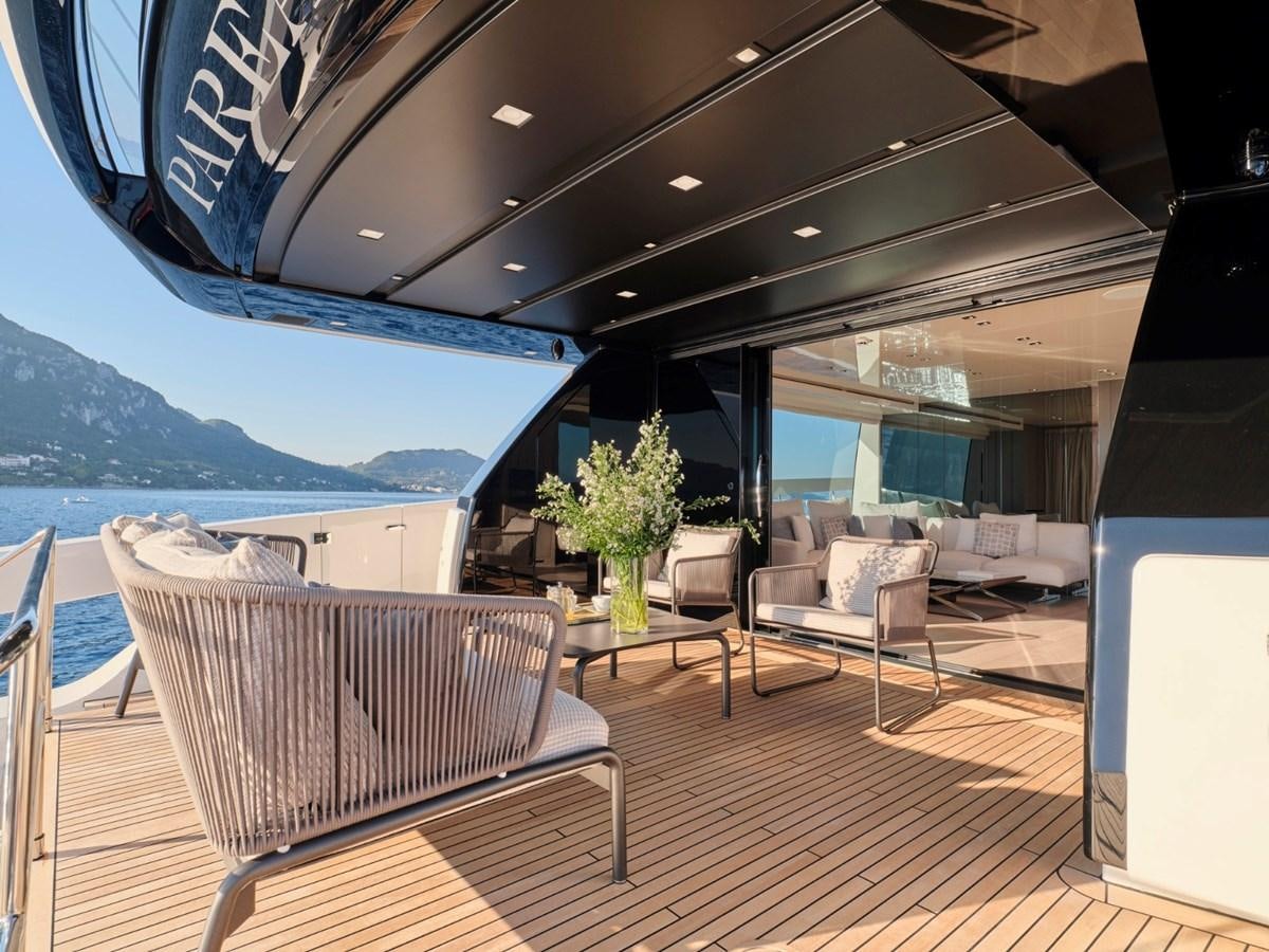 a room with a table and chairs aboard 2022 SANLORENZO SX76 #72 Yacht for Sale