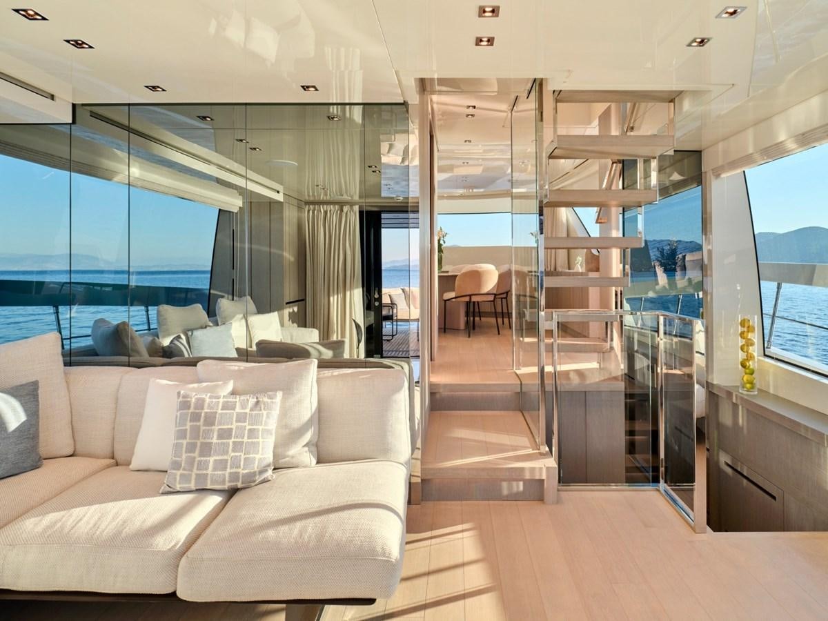 a room with a bed and a couch aboard 2022 SANLORENZO SX76 #72 Yacht for Sale