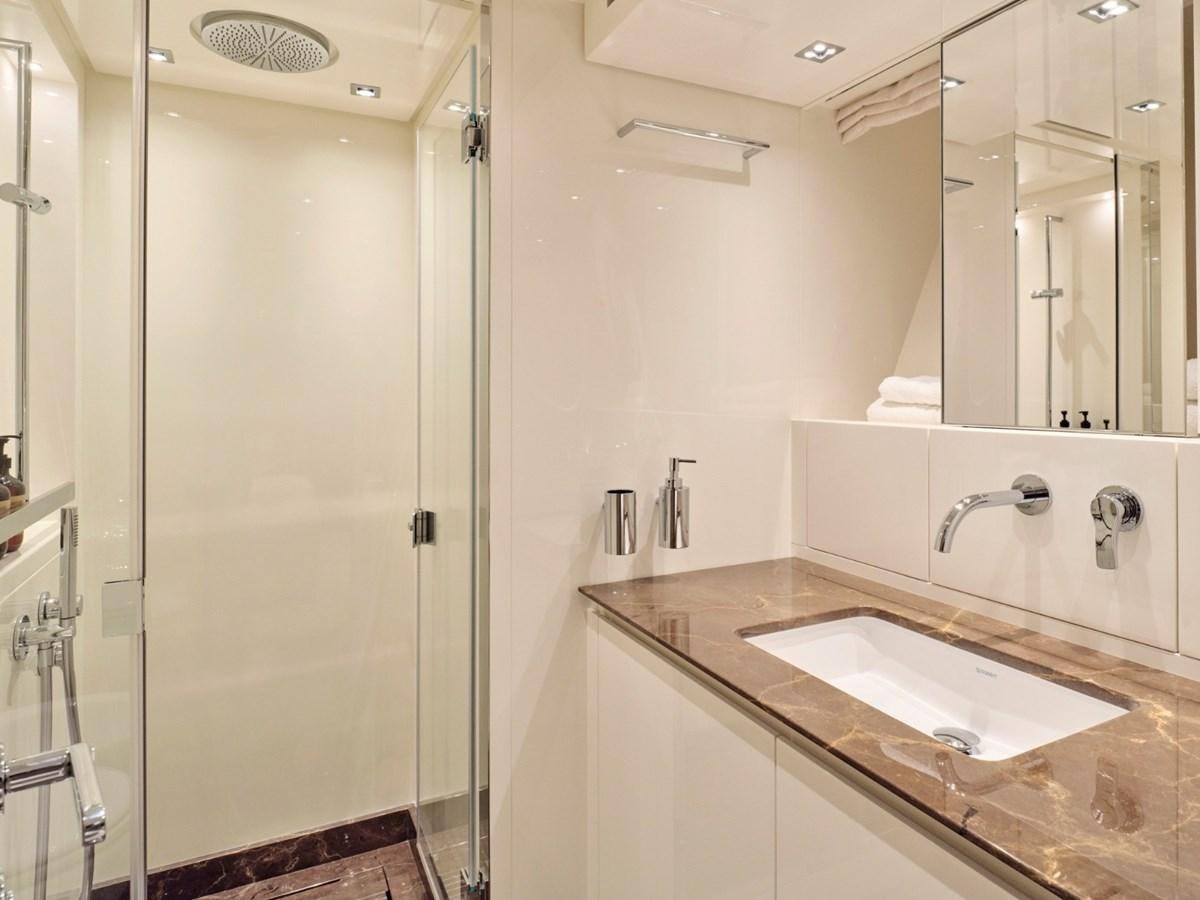 a bathroom with a sink and a shower aboard 2022 SANLORENZO SX76 #72 Yacht for Sale