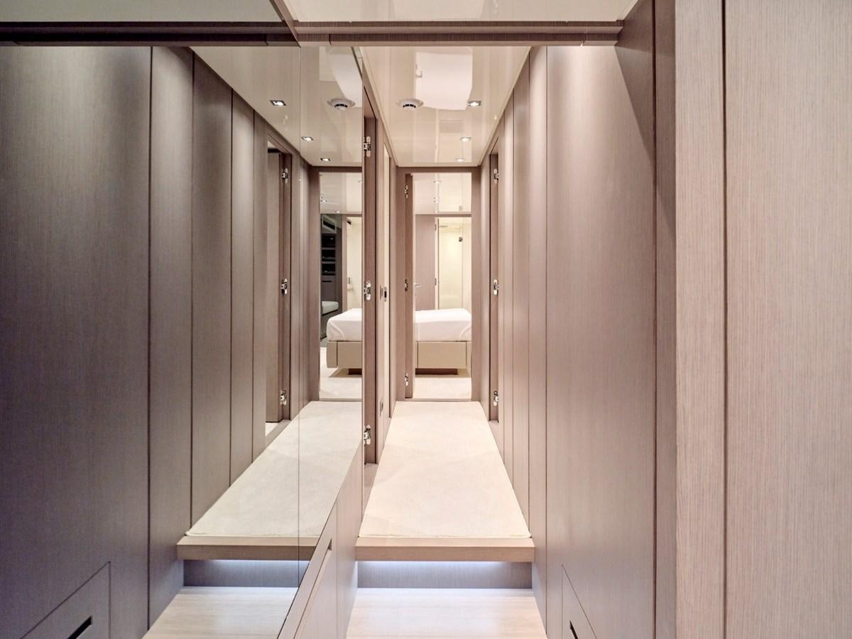 a hallway with a long hallway aboard 2022 SANLORENZO SX76 #72 Yacht for Sale