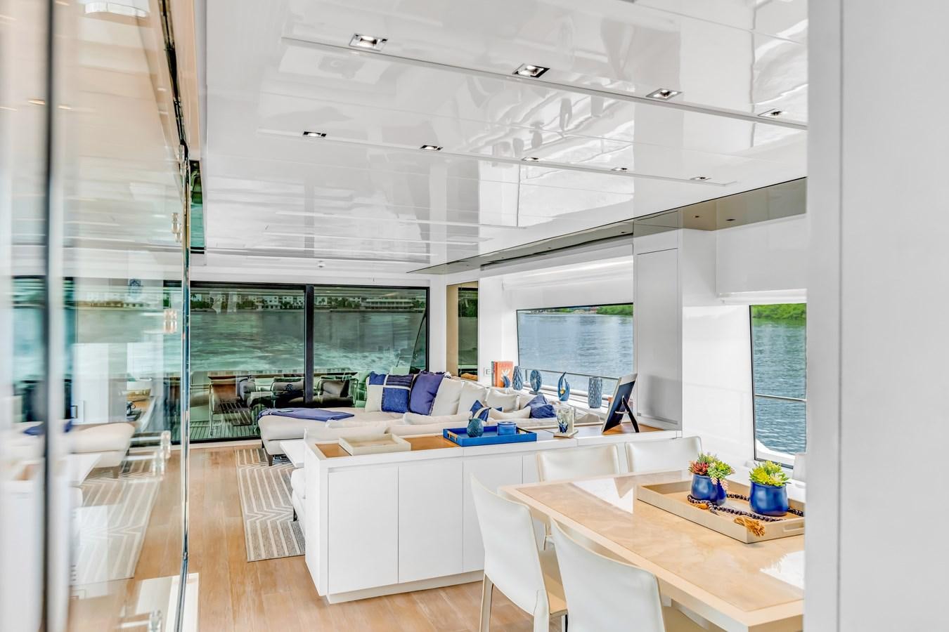 a room with a table and chairs aboard 2018 SANLORENZO SL78 Yacht for Sale