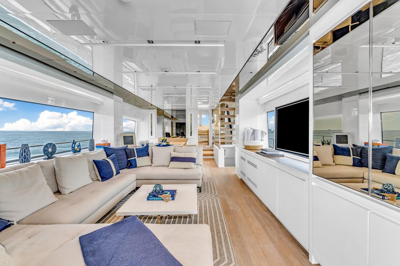 a living room with a large window aboard 2018 SANLORENZO SL78 Yacht for Sale