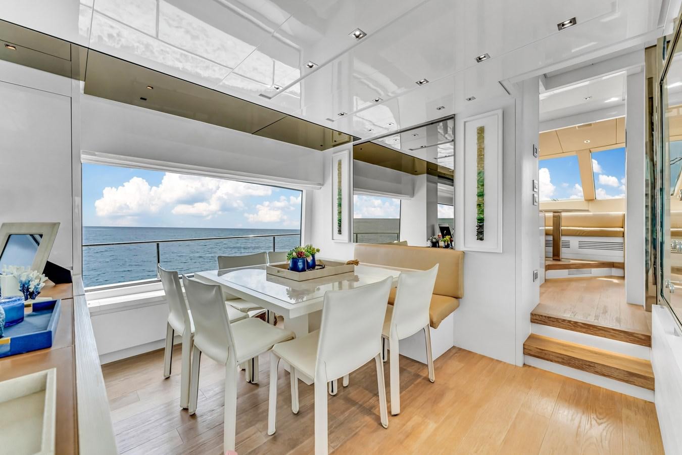 a room with a table and chairs aboard 2018 SANLORENZO SL78 Yacht for Sale