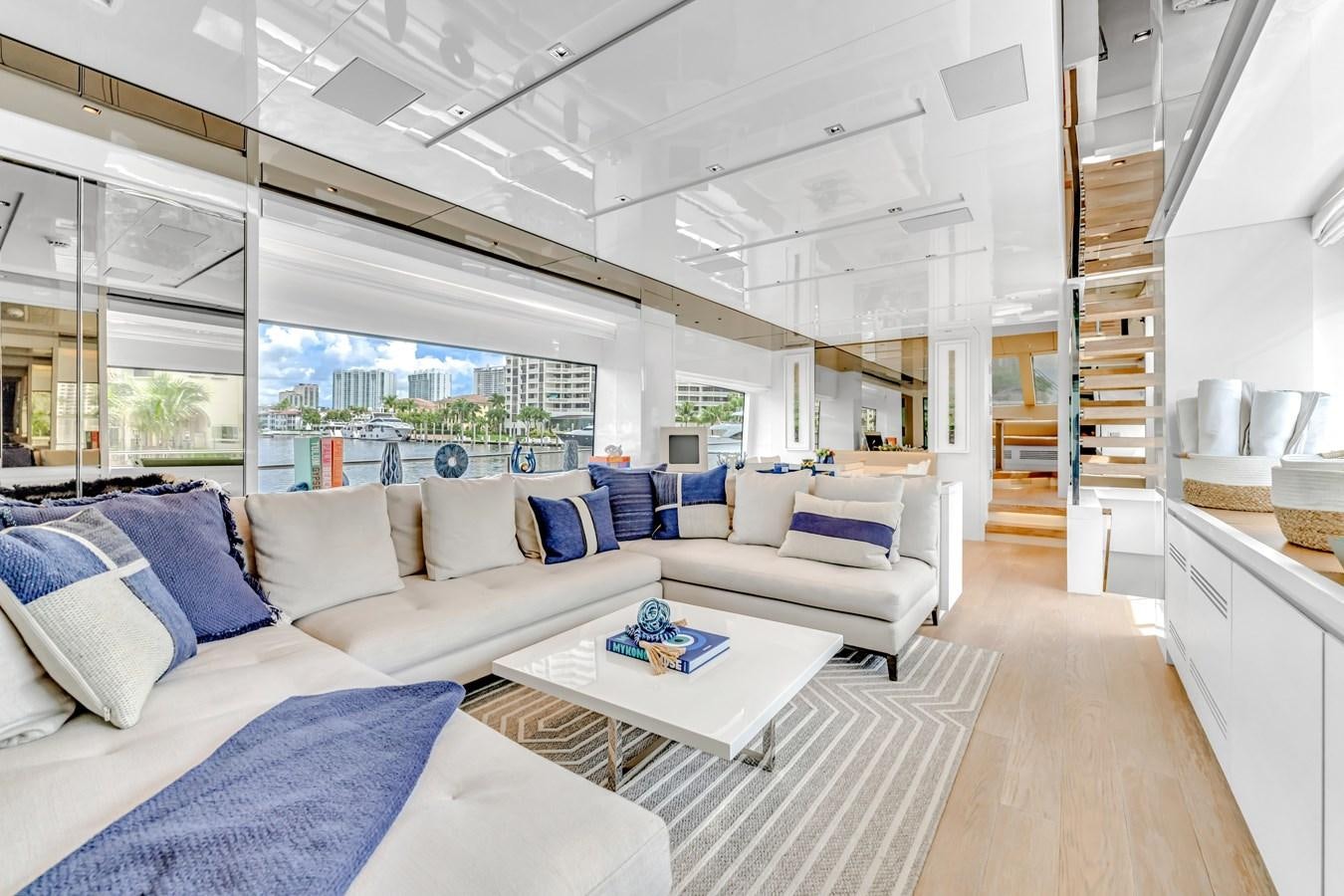 a living room with a large window aboard 2018 SANLORENZO SL78 Yacht for Sale