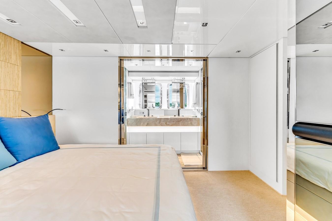 a room with a bed and a desk aboard 2018 SANLORENZO SL78 Yacht for Sale