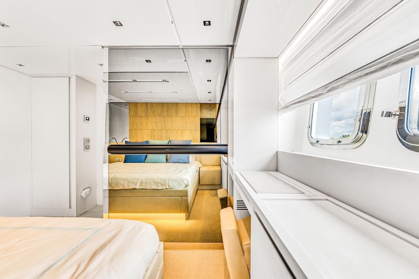 a room with a bed and a bench aboard 2018 SANLORENZO SL78 Yacht for Sale