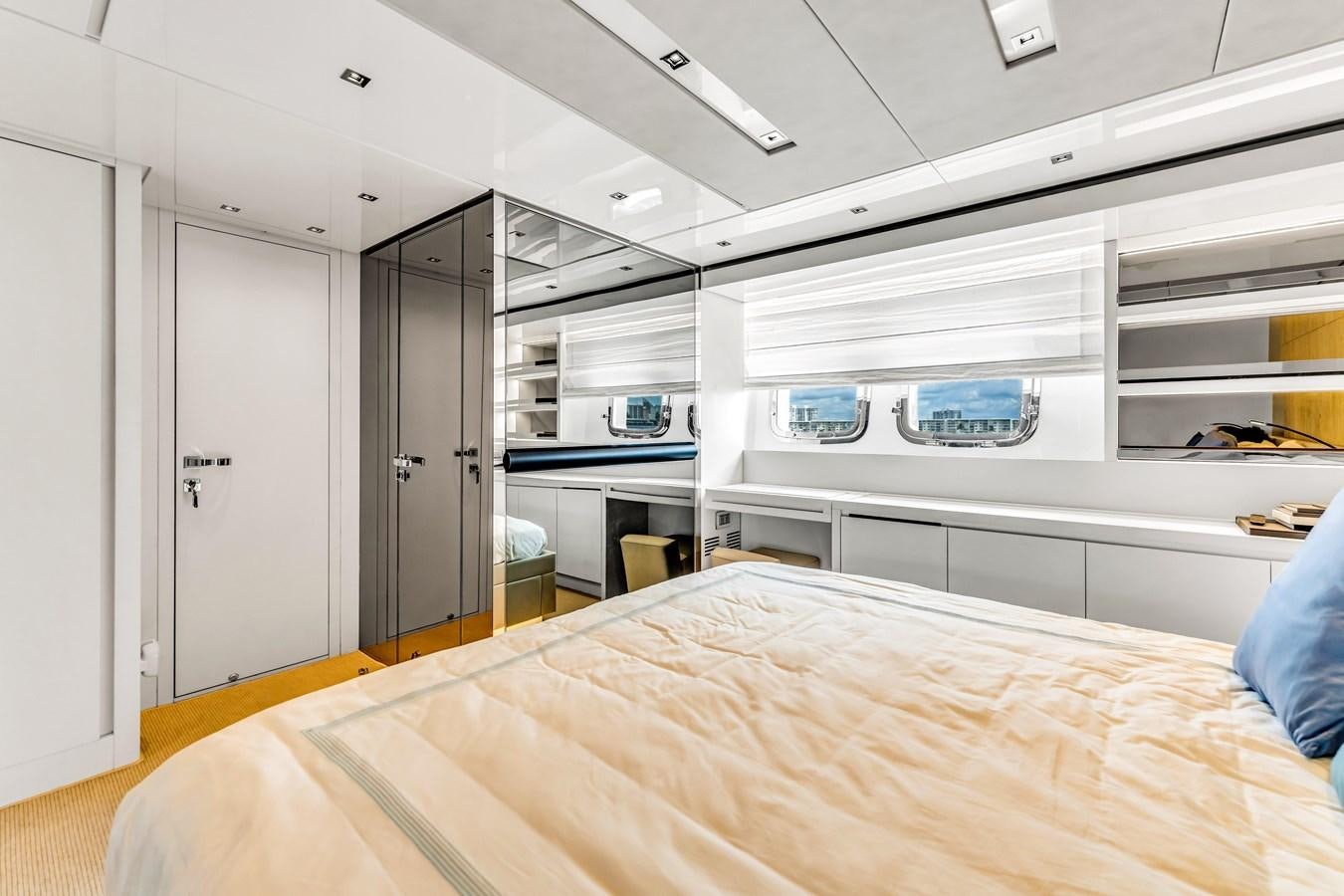 a room with a bed and a desk aboard 2018 SANLORENZO SL78 Yacht for Sale