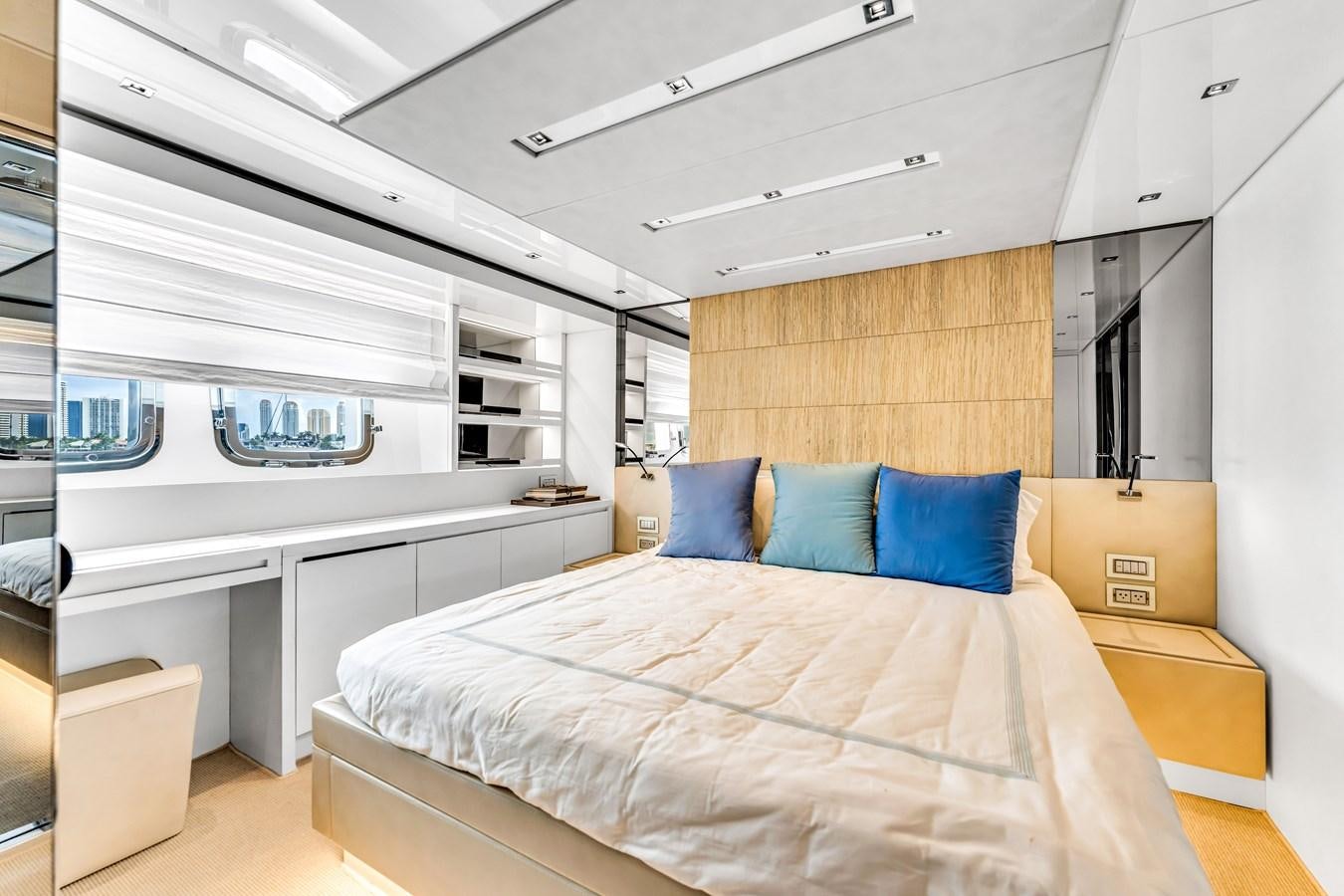 a room with a bed and a desk aboard 2018 SANLORENZO SL78 Yacht for Sale