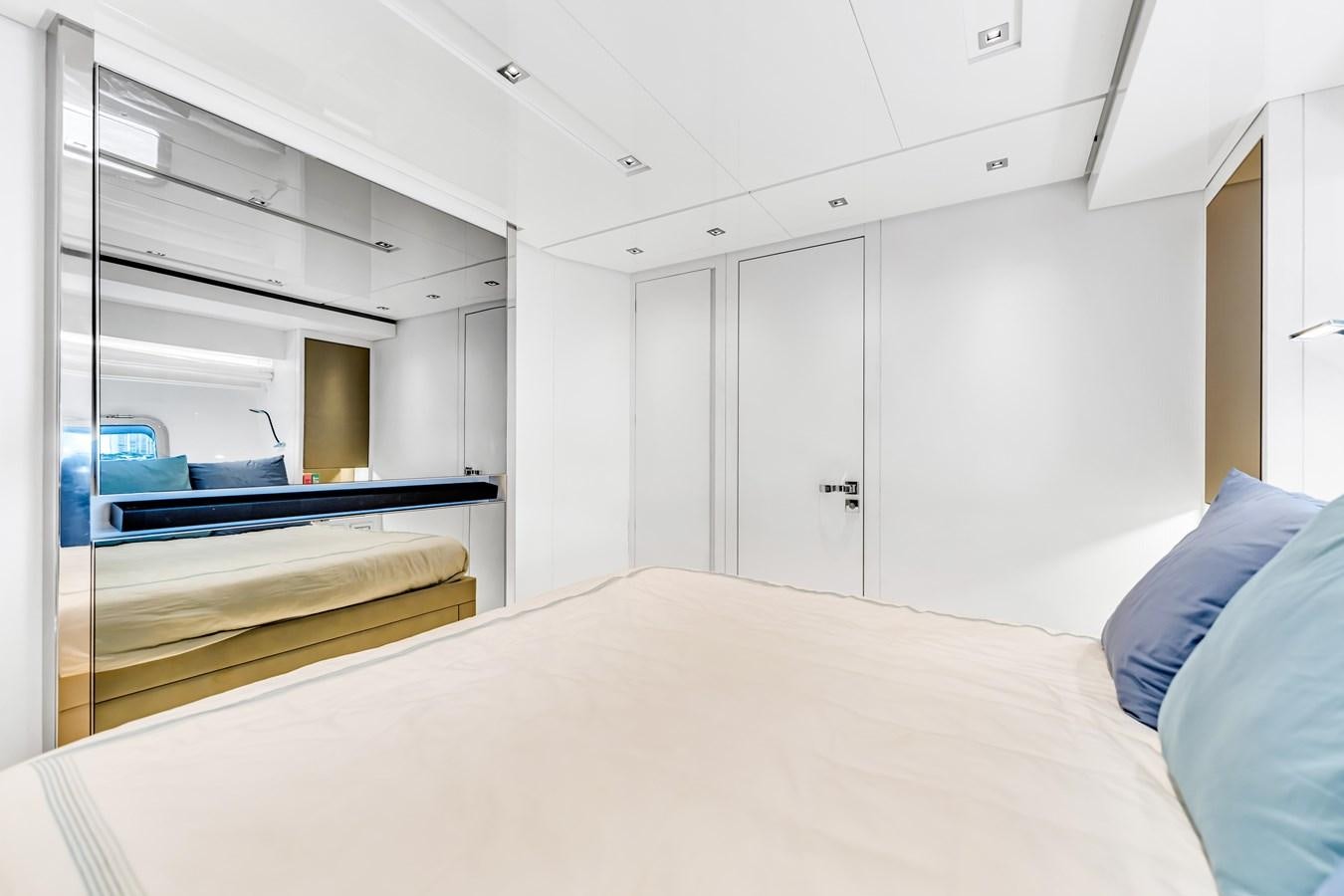 a room with a bed and a shelf aboard 2018 SANLORENZO SL78 Yacht for Sale