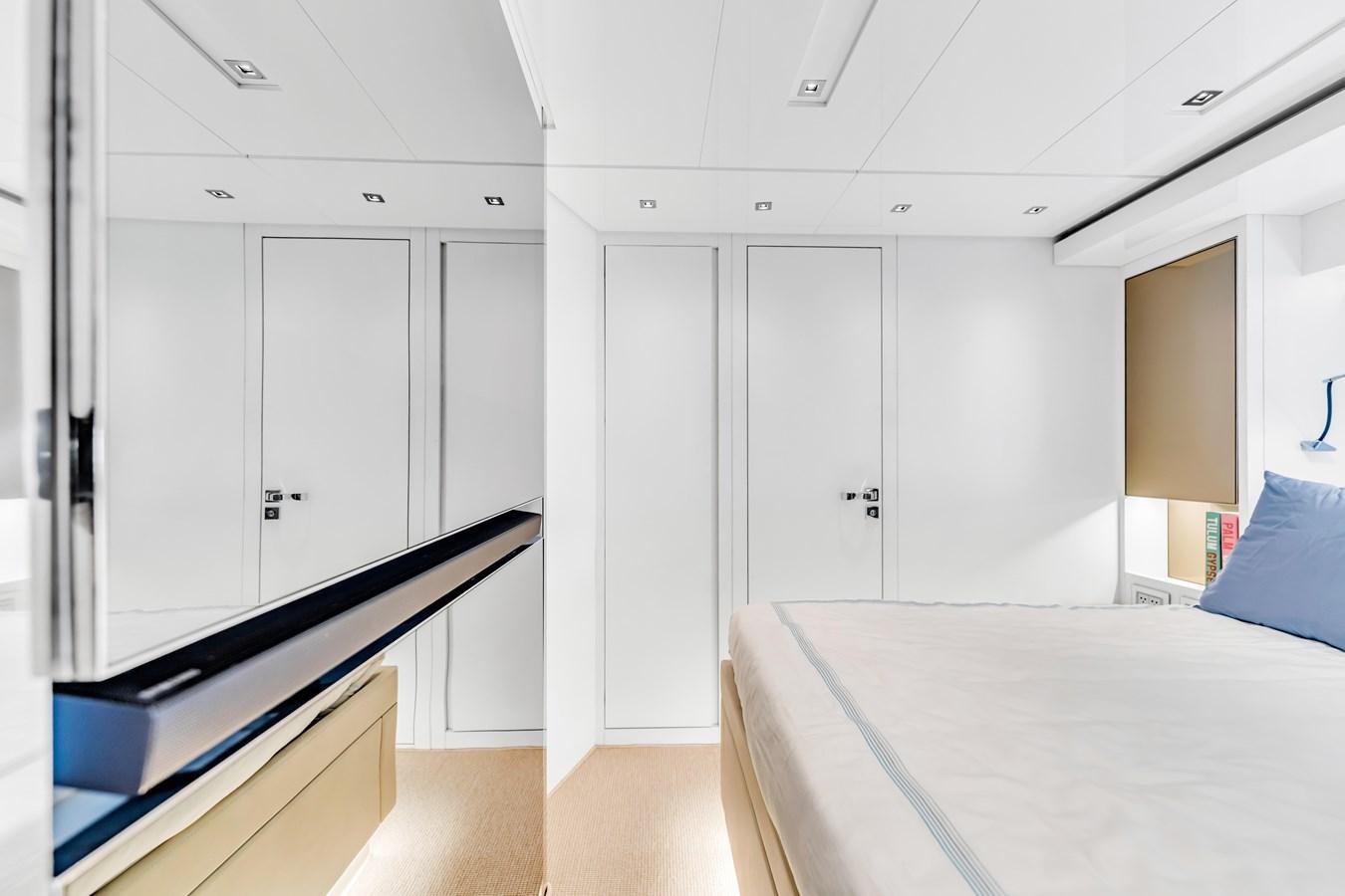 a room with white cabinets aboard 2018 SANLORENZO SL78 Yacht for Sale