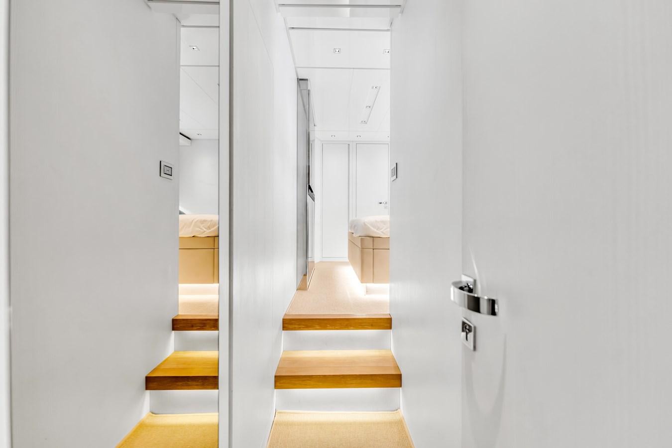 a white closet with a staircase aboard 2018 SANLORENZO SL78 Yacht for Sale