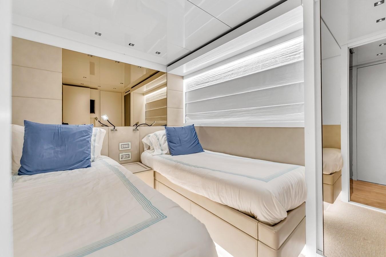 a room with beds and a window aboard 2018 SANLORENZO SL78 Yacht for Sale