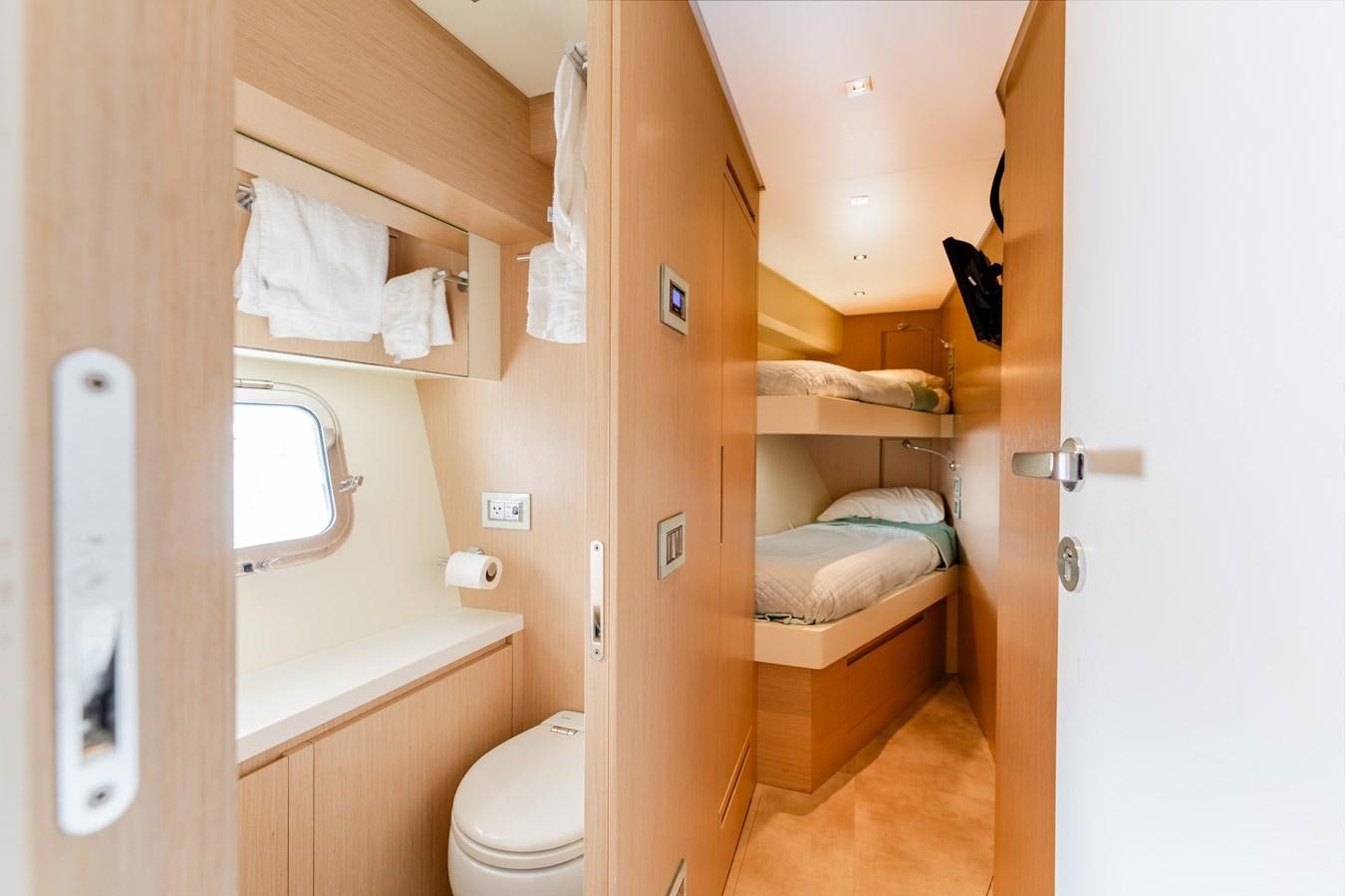 a bathroom with a toilet and a sink aboard 2018 SANLORENZO SL78 Yacht for Sale