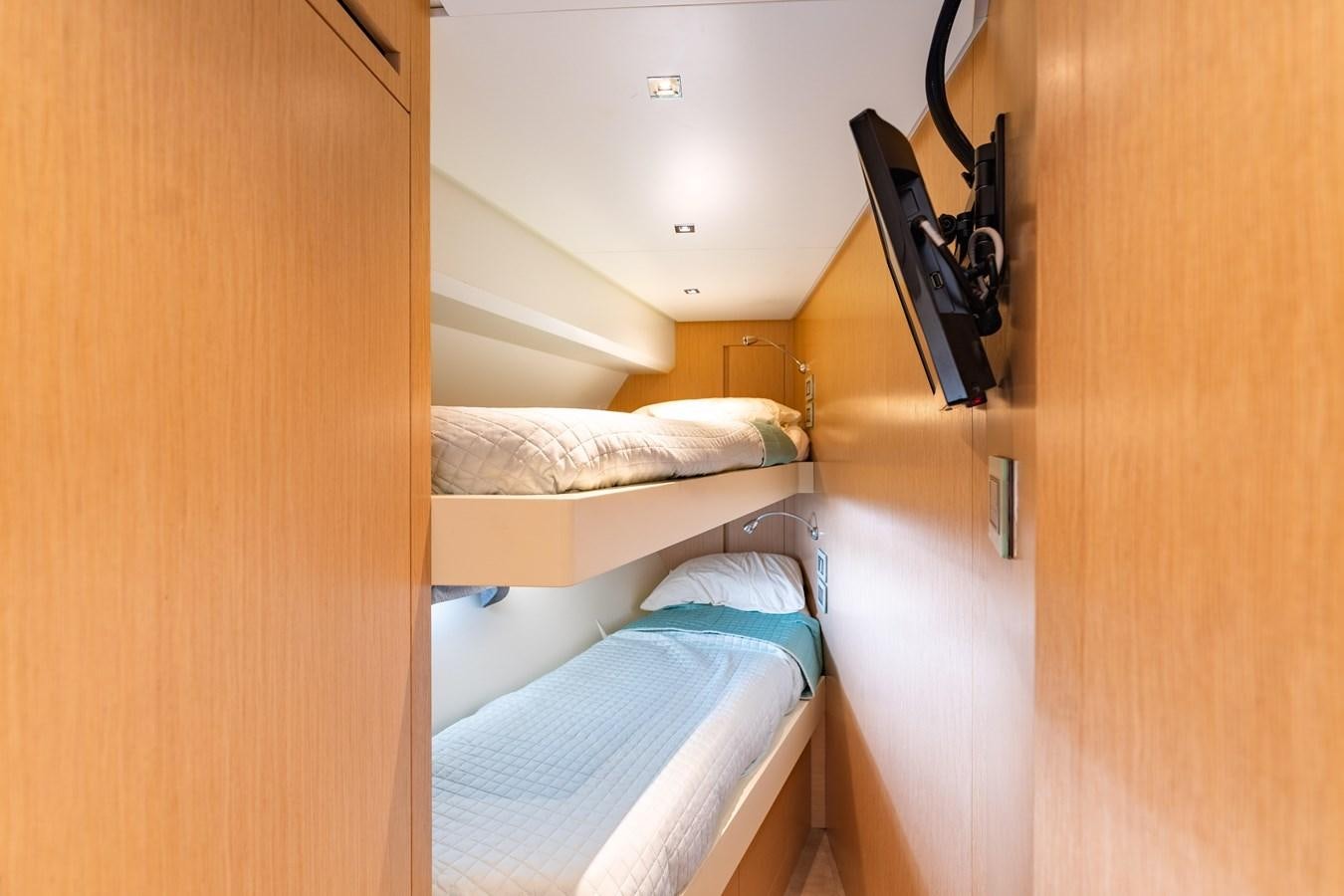 a room with bunk beds aboard 2018 SANLORENZO SL78 Yacht for Sale