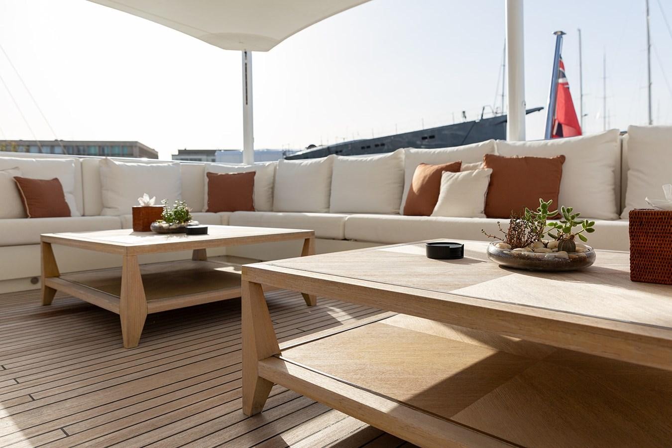 a living room with a couch and a table aboard BELONGERS Yacht for Sale