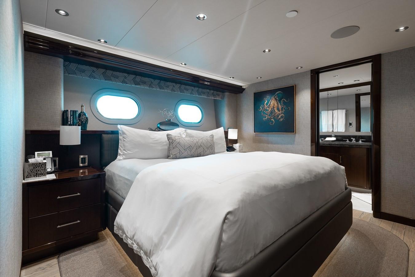 a room with two beds aboard FIGARO Yacht for Sale