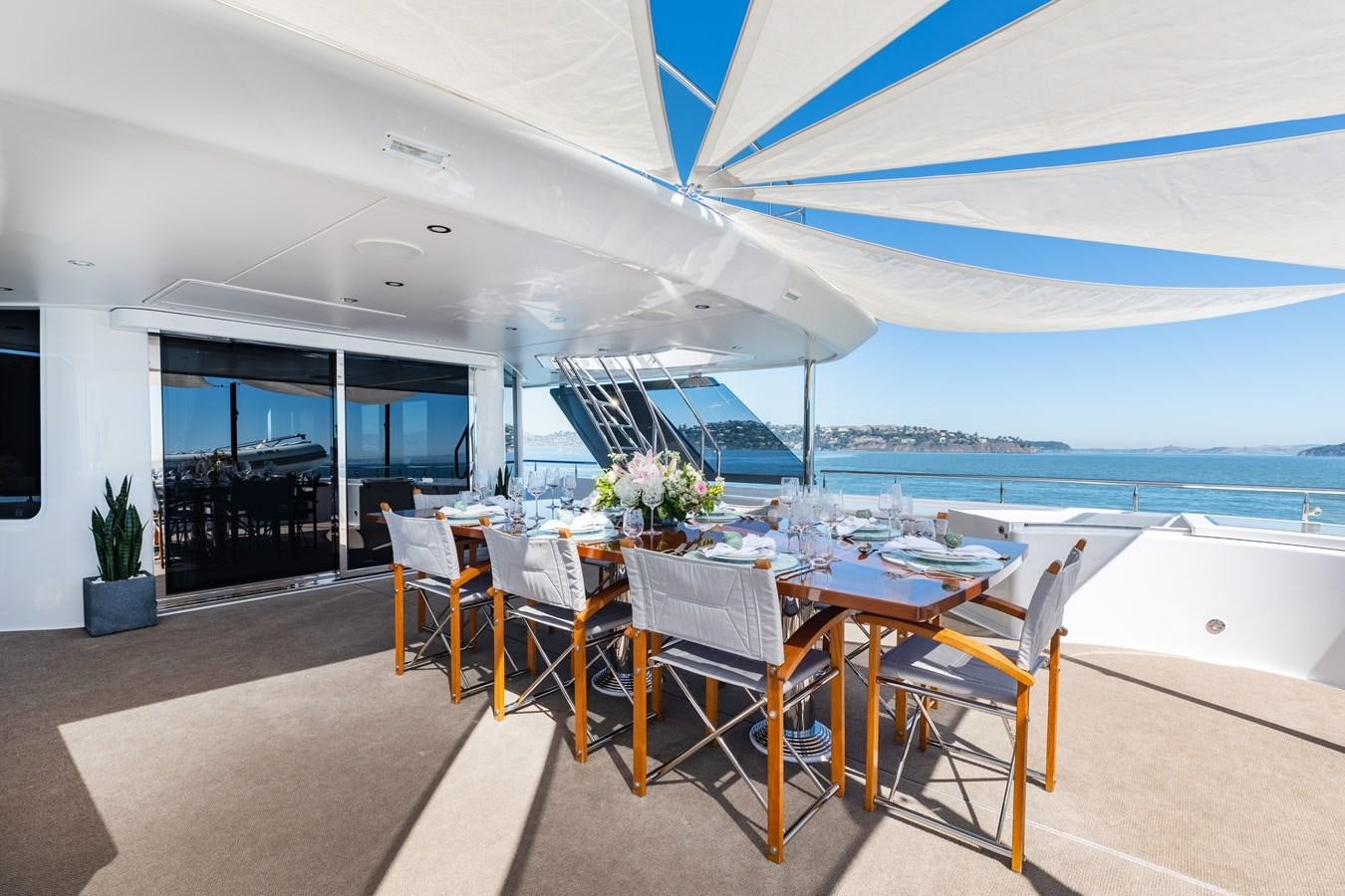 a table set for a meal aboard FIGARO Yacht for Sale