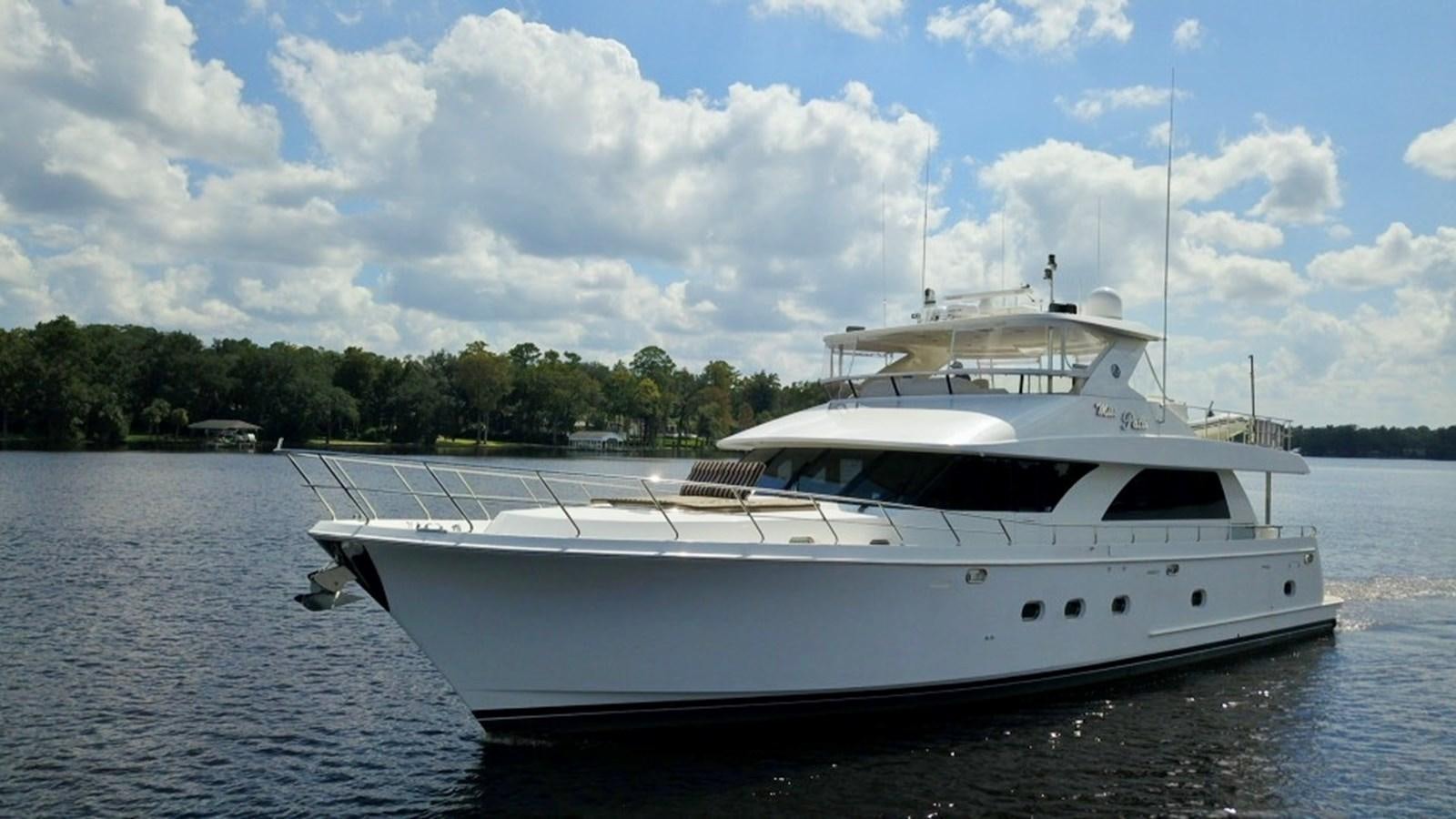 a white yacht on the water aboard MISS PATTI Yacht for Sale