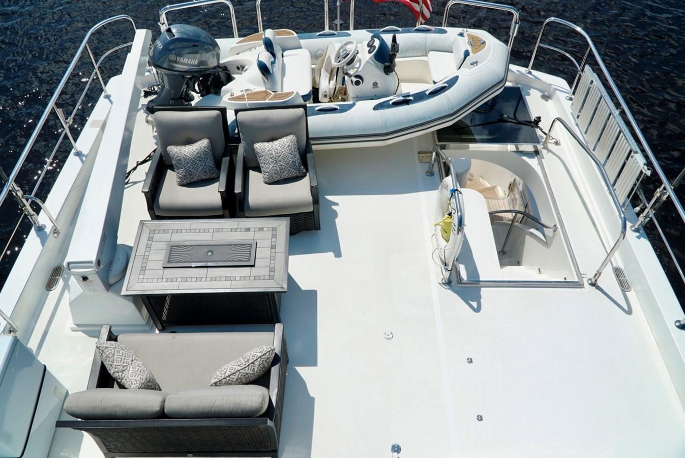 a boat with a sign on the front aboard MISS PATTI Yacht for Sale