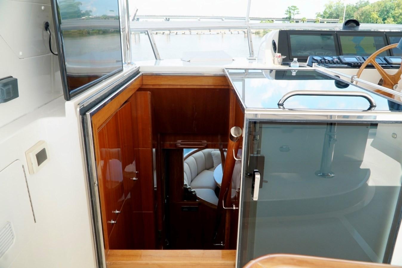 a boat with a door open aboard MISS PATTI Yacht for Sale