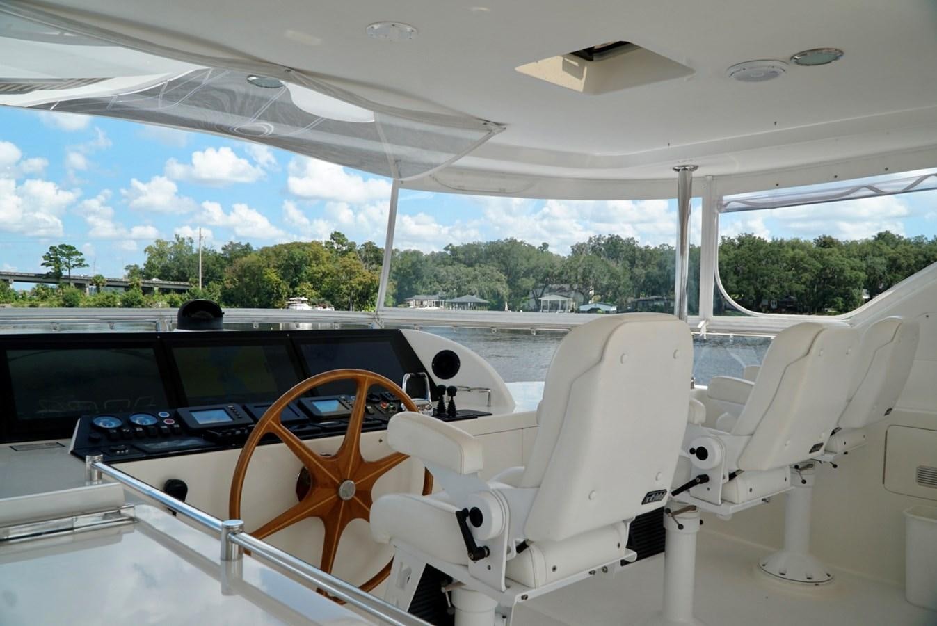 a white chair on a boat aboard MISS PATTI Yacht for Sale
