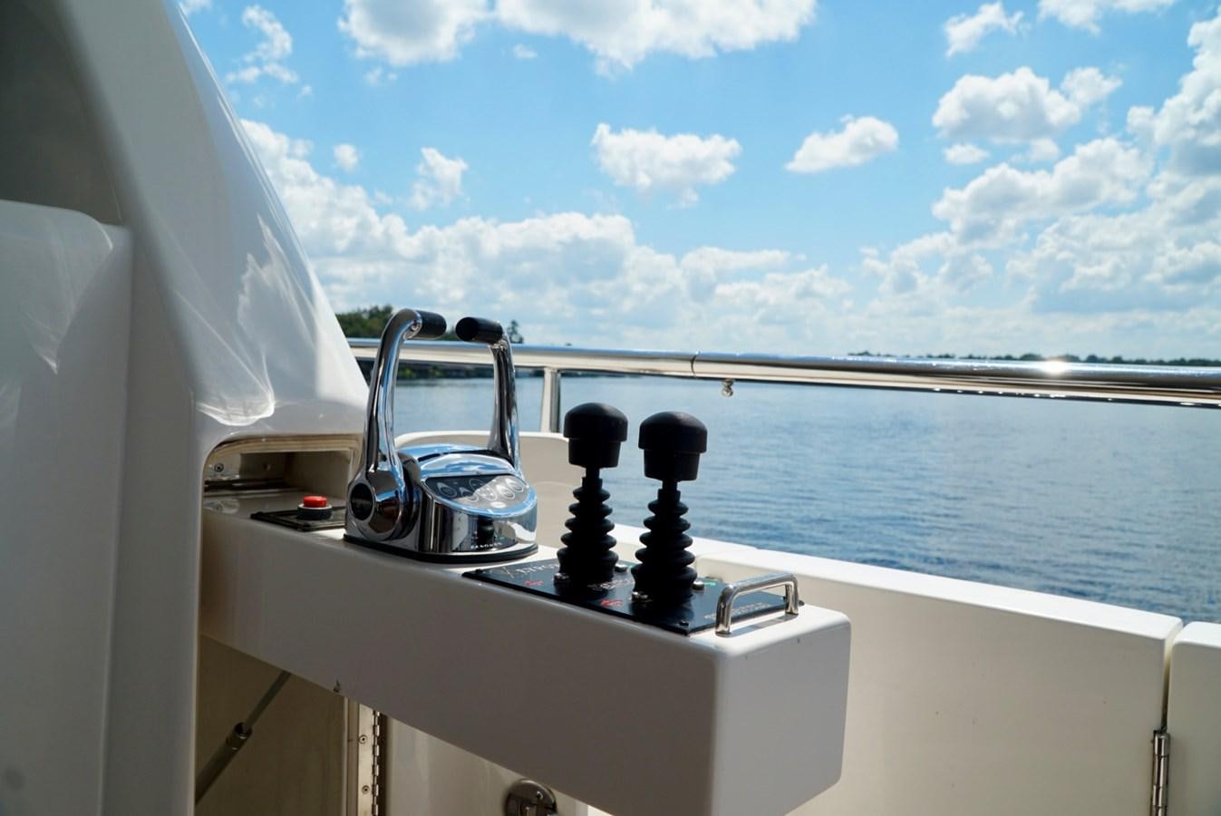 a boat with a water slide aboard MISS PATTI Yacht for Sale