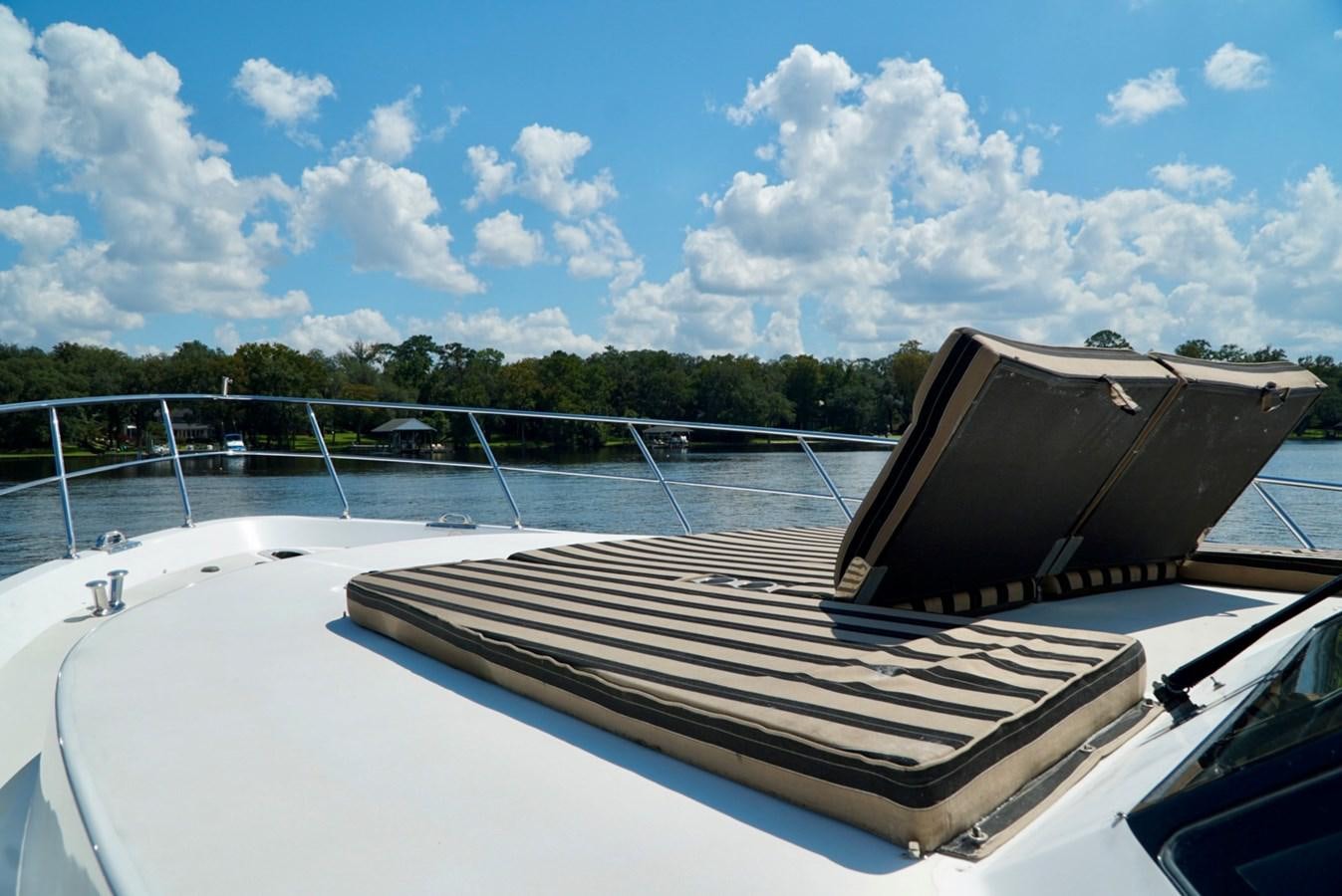 a boat with a canopy aboard MISS PATTI Yacht for Sale