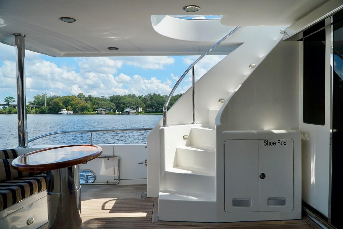 a white refrigerator in a room aboard MISS PATTI Yacht for Sale