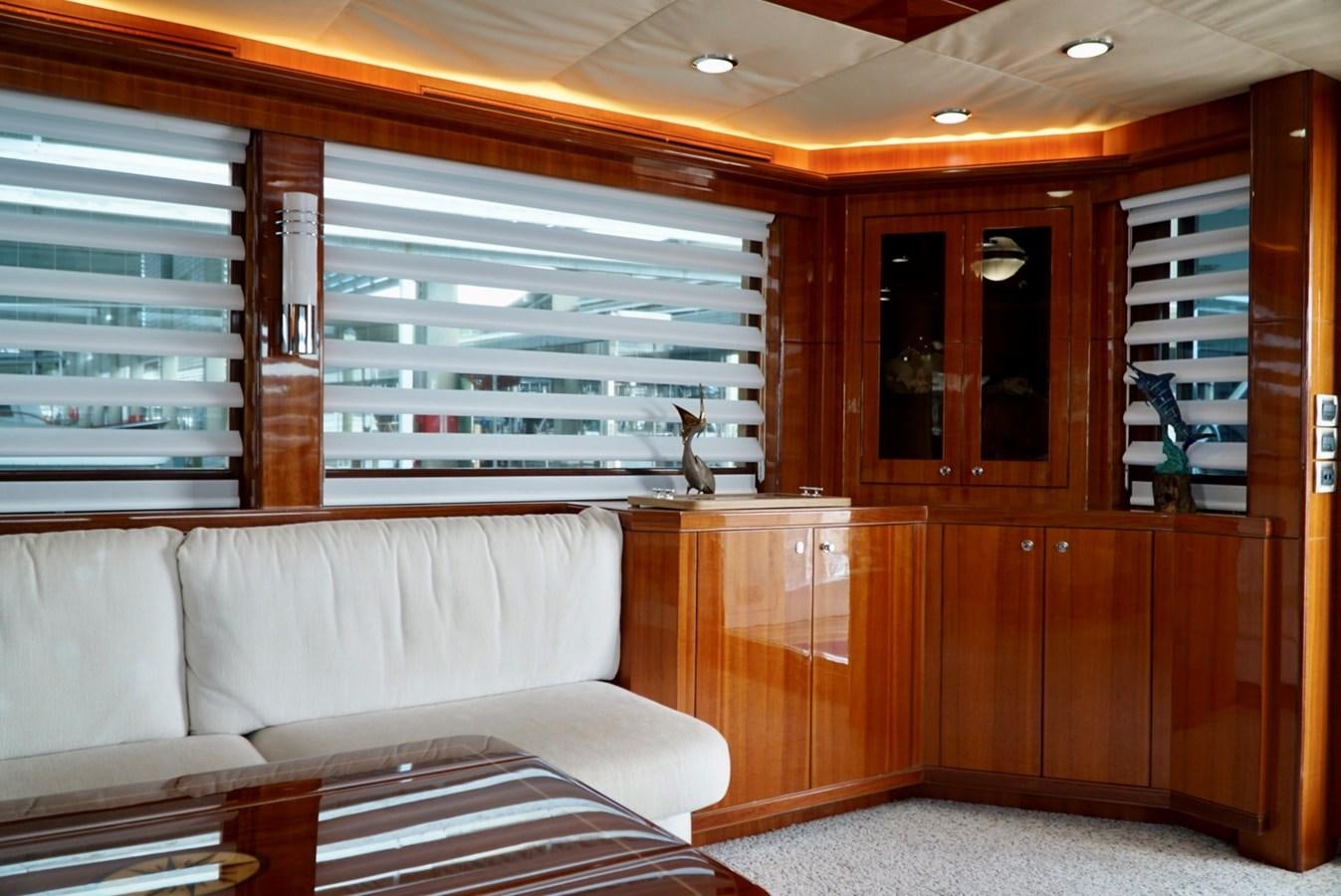 a room with a couch and a table aboard MISS PATTI Yacht for Sale