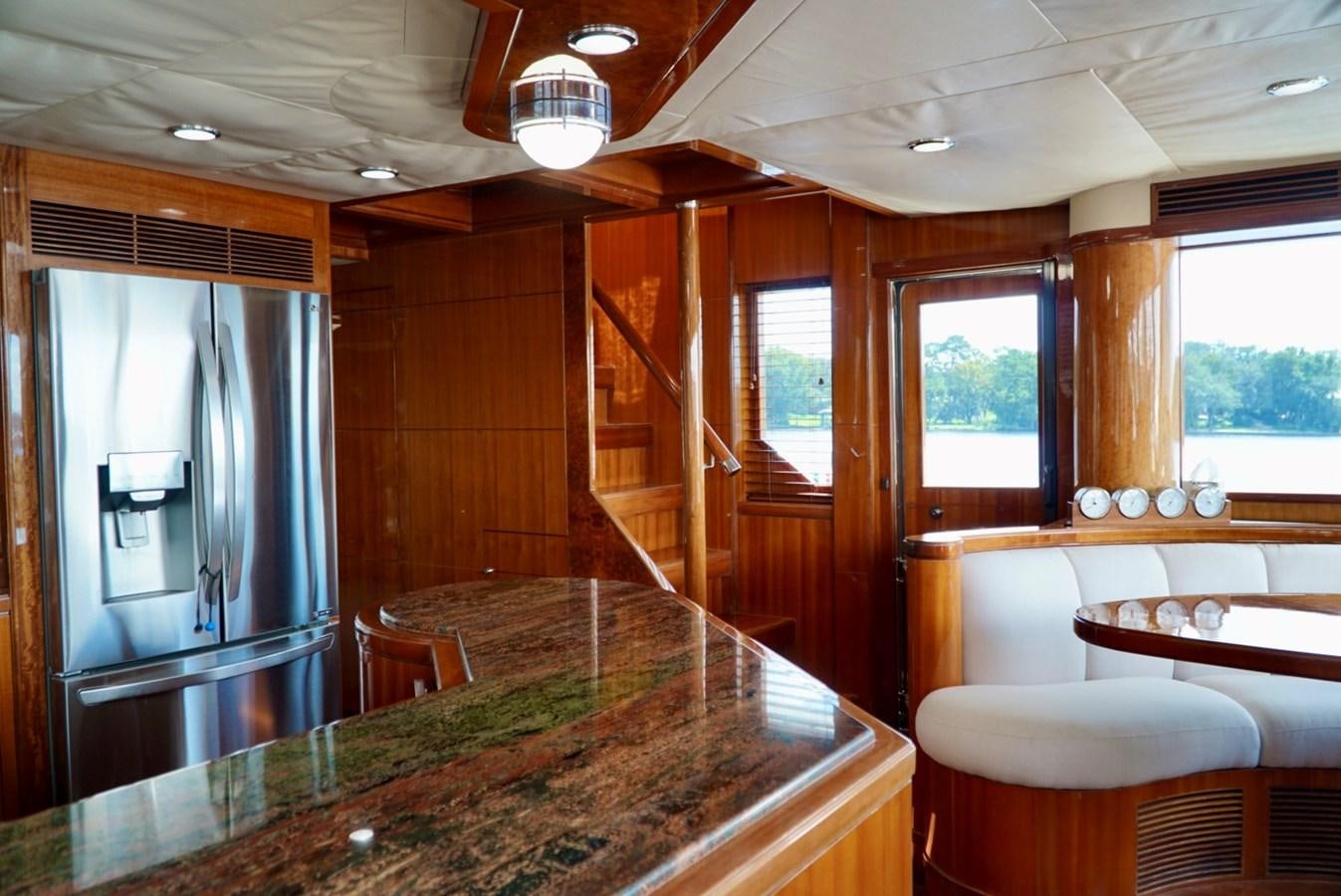 a large kitchen with a large island aboard MISS PATTI Yacht for Sale