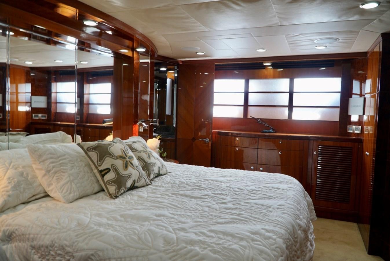 a bed in a room aboard MISS PATTI Yacht for Sale