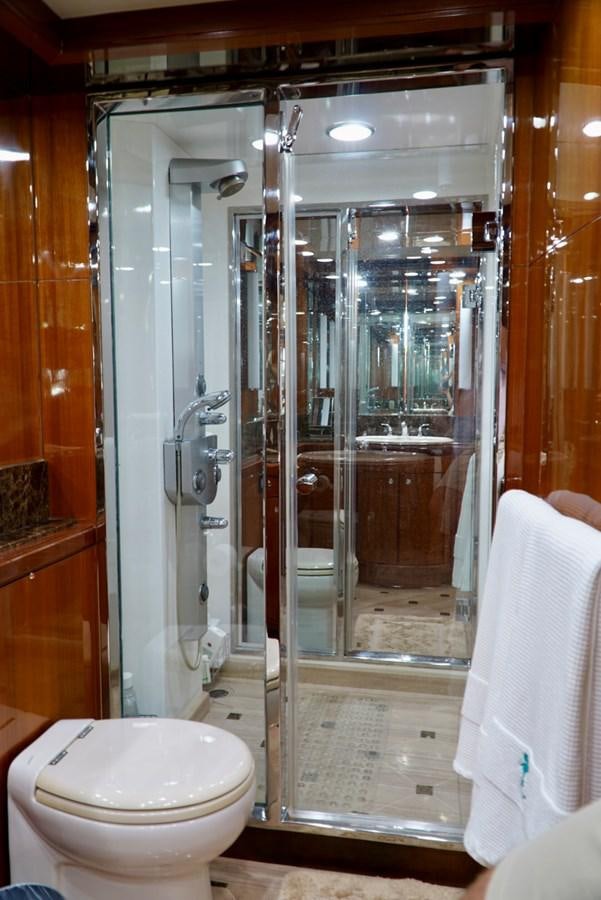 a bathroom with a glass shower aboard MISS PATTI Yacht for Sale