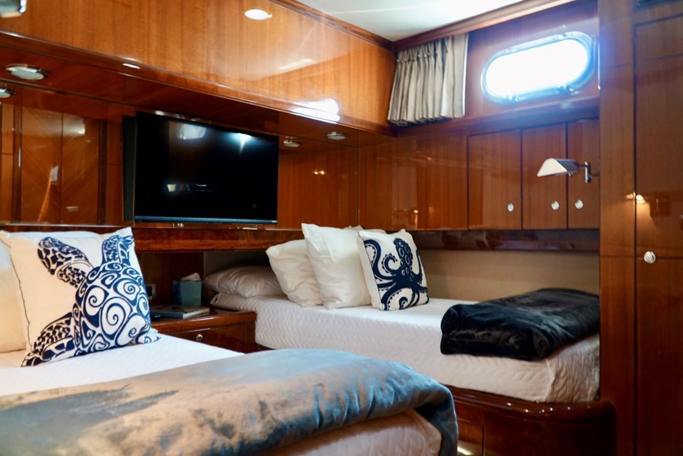 a room with two beds aboard MISS PATTI Yacht for Sale