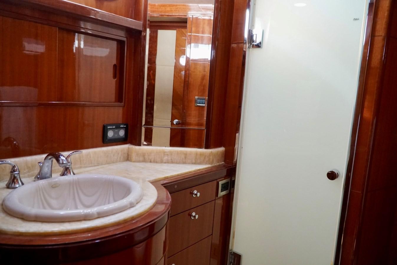 a bathroom with a sink and cabinets aboard MISS PATTI Yacht for Sale