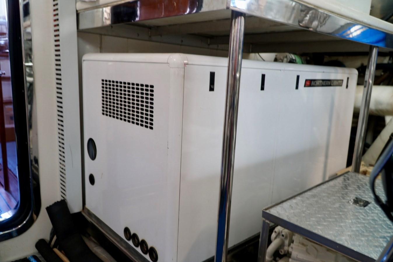 a large white machine aboard MISS PATTI Yacht for Sale